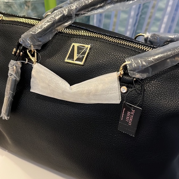 Black mid size VS purse with gold hardware - Picture 2 of 5